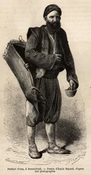 A water carrier, itinerant merchant posing with his equipment, a kind of tank box and a container used as a measure and cup, in Roustchouk (Romania) (engraving after the drawing of Emile Bayard, illustrating the journey to Bulgaria)