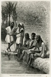 Black men and women of the Sahara, on the banks of the Oued Rir. Engraving by E. Bayard to illustrate The Algerian Sahara by V. Largeau, 1874-1878, published in Le Tour du monde under the direction of Édouard Charton (1807-1890)
