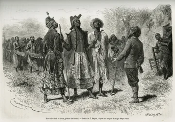 The three conductors (or sovas), princes of Dombe (Angola), and their suite of musicians and a courtier, coming to meet the explorer S. Pinto. Engraving by Emile Bayard to illustrate the story How I