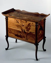 Art Nouveau style commode with polychrome inlays and tray top