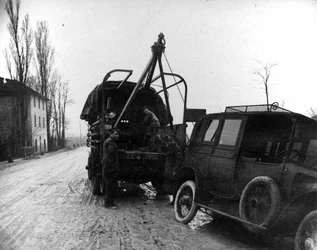 British soldiers towing a motor vehicle in Italy during WWI