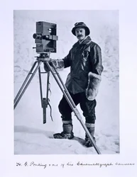 Herbert Ponting with a cinematographic camera on the Terra Nova expedition to the South Pole lead by Captain Scott, 1910-12