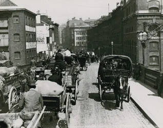Horse-Drawn Carts Passing Over Southwark Bridge