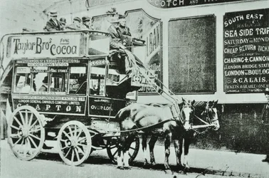 Horse-drawn omnibus with passengers