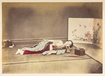 Japanese woman sleeping, Studio portrait of a young Japanese woman sleeping, one breast exposed and with her head resting on a wooden pillow