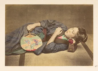Japanese woman sleeping, Three-quarter length studio portrait