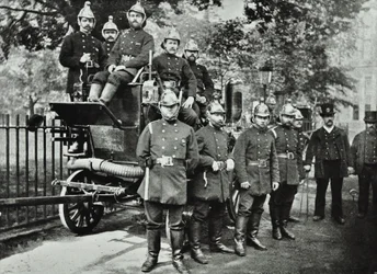 London Fire Brigade: group of firemen, with engine and turncocks, 1895