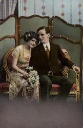 Man and woman with a bunch of flowers