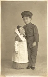 Young girl and boy in WW1 role playing