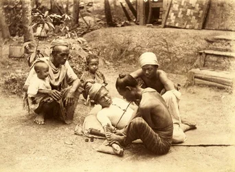 A Shan man being Tattooed, 1890