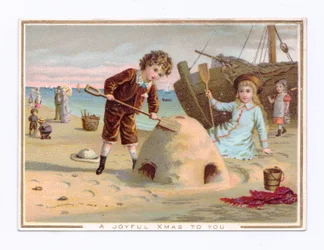Victorian Christmas Card of a Boy Building a Sand Castle on a Beach, c.1880