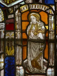 A panel in the east window depicting St John