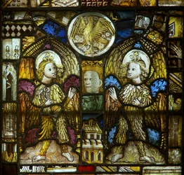 A panel in the east window depicting feathered angels with Passion Instruments and St John