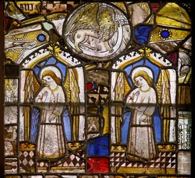 A panel in the east window depicting two angels and St Mark