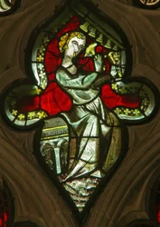A window in the Lady Chapel depicting a musician angel with bells