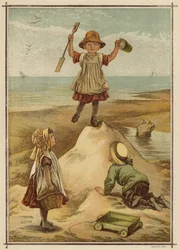 Children playing king of the castle at the seaside