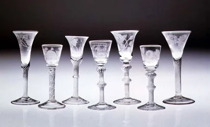Collection of engraved glasses with opaque and air twist stems