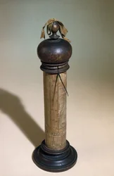 Column sundial painted with a figure of St. Christopher