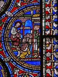 Detail from one of the Bible Windows depicting St. Peter preaching