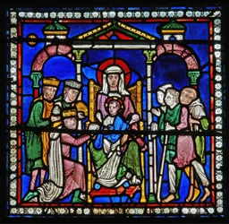 Detail from one of the Bible Windows depicting the adoration of the Magi and the Shepherds