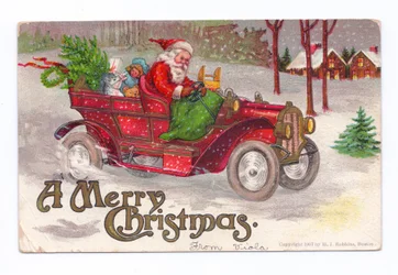 Edwardian Christmas Postcard of Father Christmas Driving a Vintage Car Through the Snow, c.1910