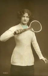 Girl holding tennis racquet