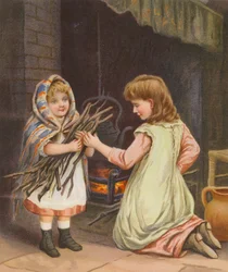 Girls putting wood on the fire