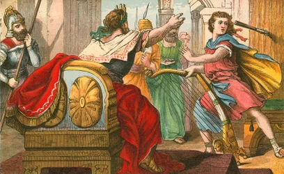 King Saul throwing a javelin at David