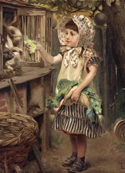 Little Girl Feeding Rabbits