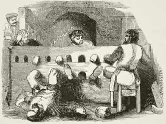Prisoners locked in the stocks, from 