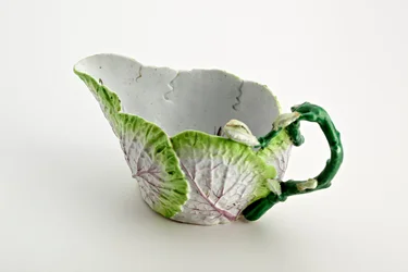 Staffordshire sauceboat formed from moulded leaves and twig handle, c.1749-60