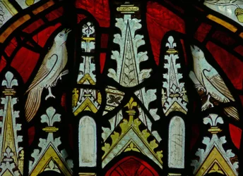 The East window depicting a canopy with birds