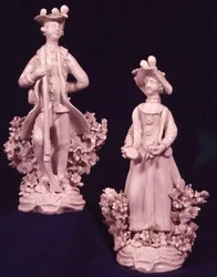 Two Worcester figures supported by a bocage, Dr. Wall period