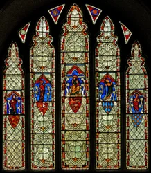 Window Ew depicting the Crucifixion and St Mary, St John, St Mary Magdalene and St Margaret