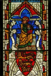 Window Ew depicting the Virgin and Child and the arms of England