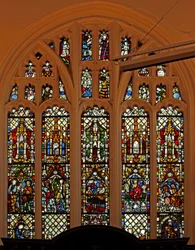 Window depicting the east window with some 14th century panels from the previous church