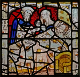 Window N4 depicting the Works of Mercy: visiting the sick