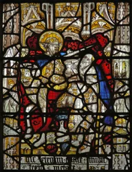 Window depicting the Charity of St Martin: he divides his cloak