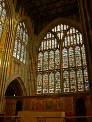 Window depicting a view of the north side of the church at the east end