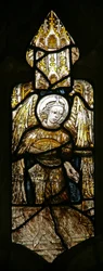 Window depicting an angel - musician