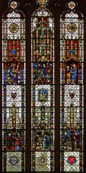 Window w31 depicting a composite window with St Edmund, St William, St George, Annunciation, Adoration of the Magi