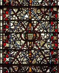 Window W59 depicting grisaille and a head