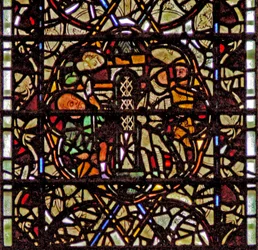 Window W60 depicting St Paul is lowered in a basket
