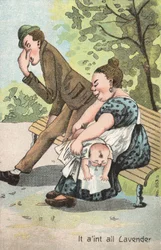 Woman changing a baby in the park