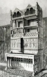 Writing table and book case in the architectural exhibition, executed by Mr. James Forsyth, from the design of Mr. R. Norman Shaw