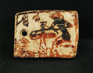 A Potter Sitting at His Wheel