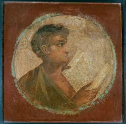 Medallion with the Bust of a Young Man Reading in a Scroll