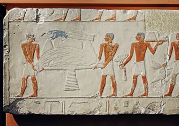 Servants carrying offerings