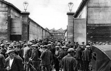 Workers at the entrance of a Billancourt factory, Paris