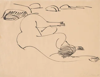 Erna Lying on the Beach Among Rocks